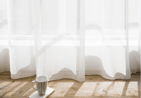 coffee-cup-by-net-curtains-2022-03-07-23-57-33-utc 1